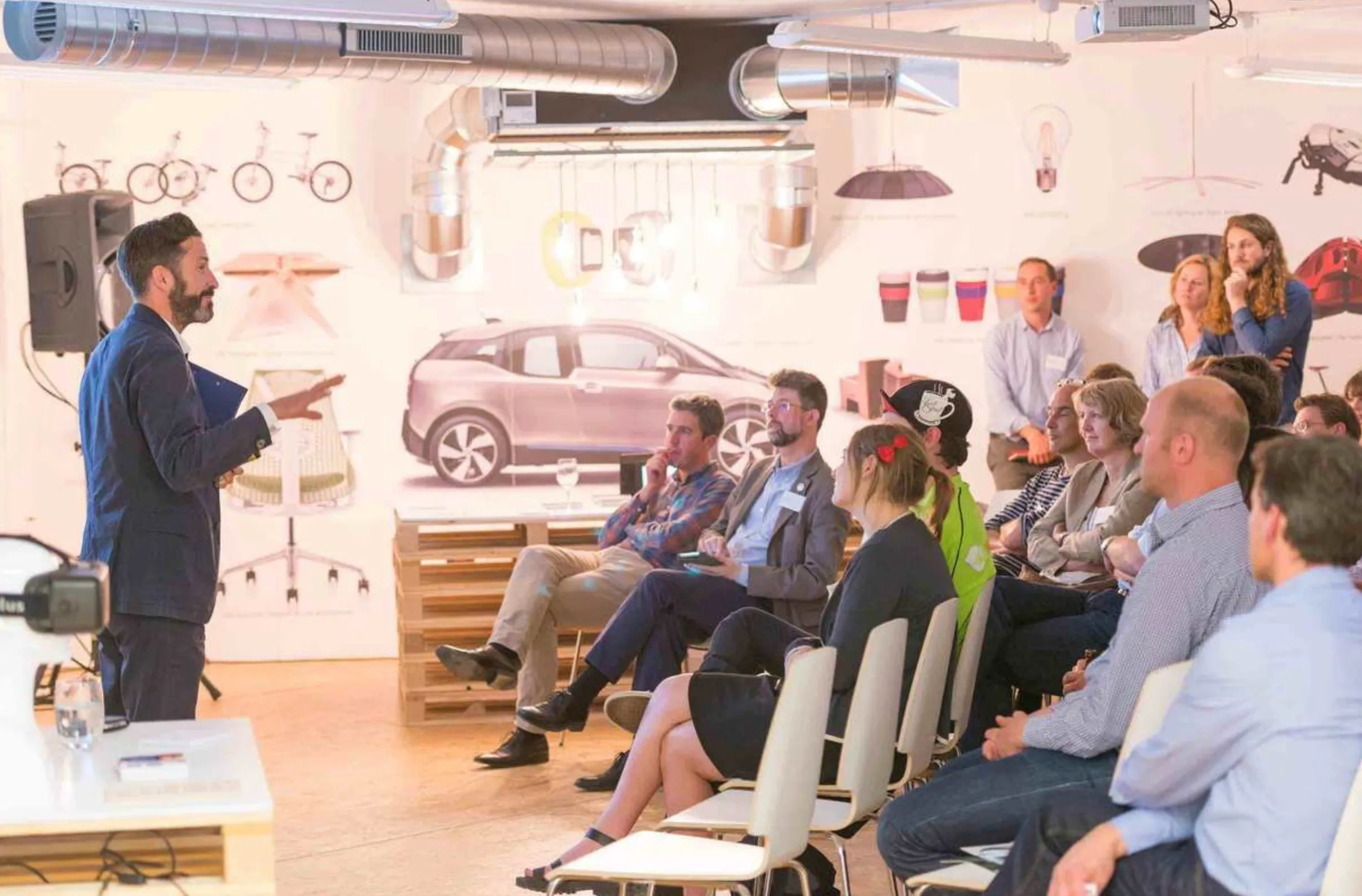 People at a design talk